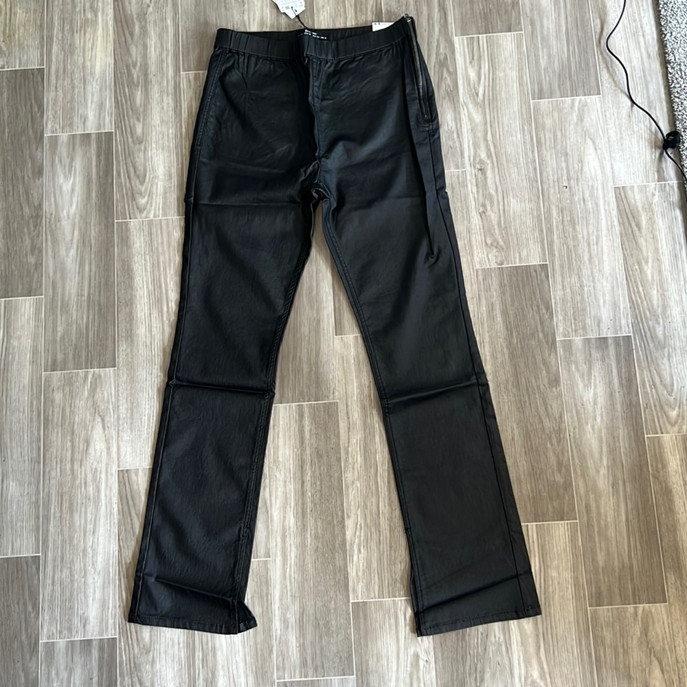 Stradivarius black flare jeans with slit hem detail in black.